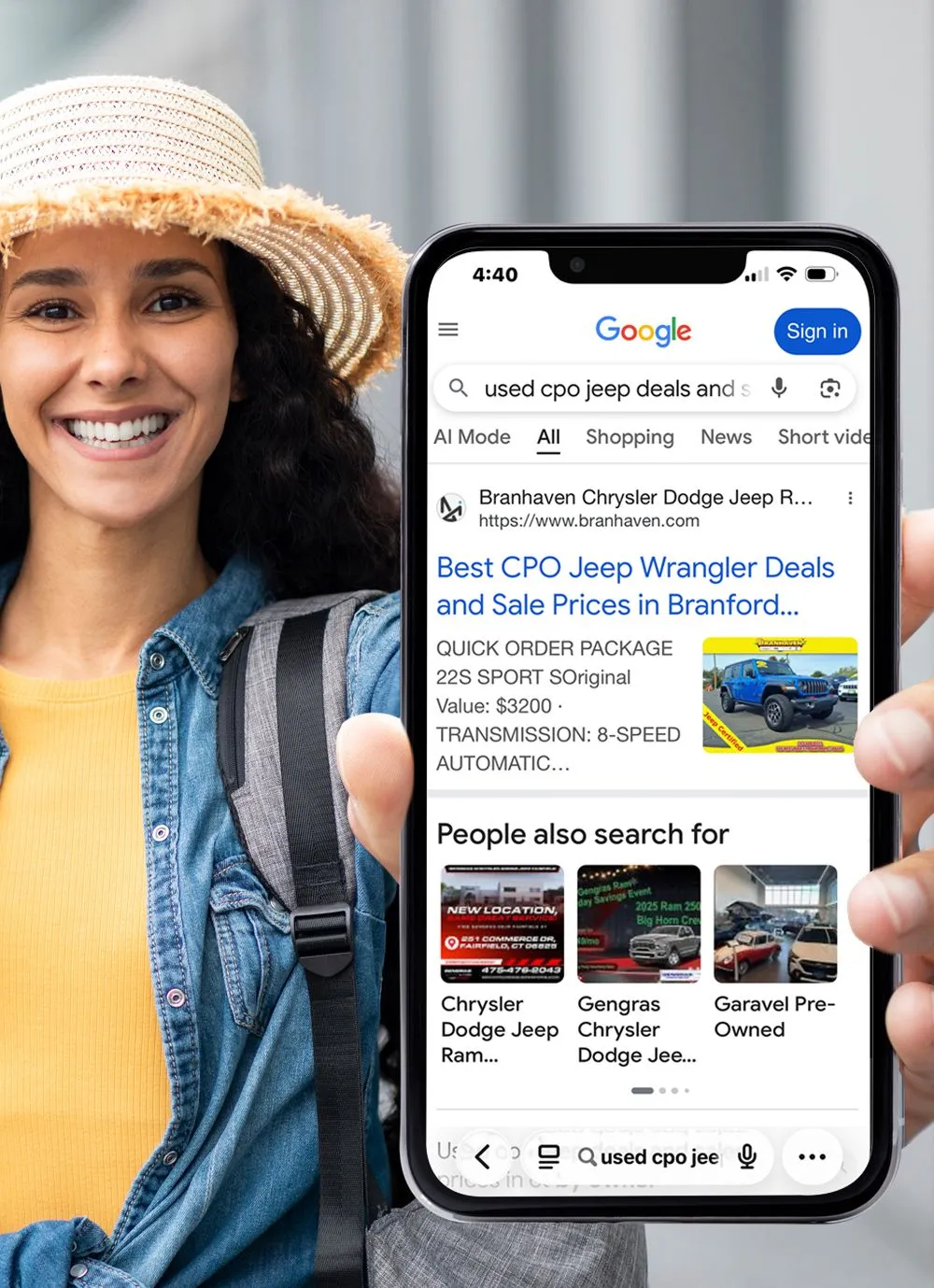person-holding-phone-2-1920w automotive seo girl holding phone